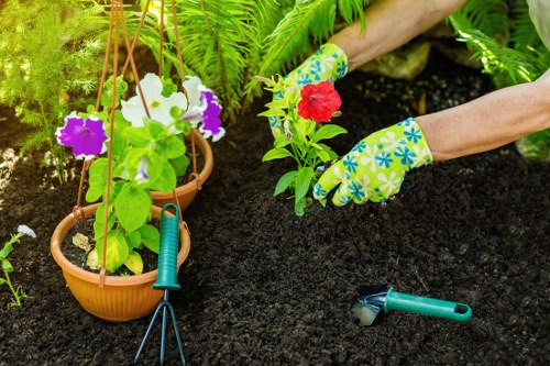 Gardeners reviewing safety procedures before outdoor work